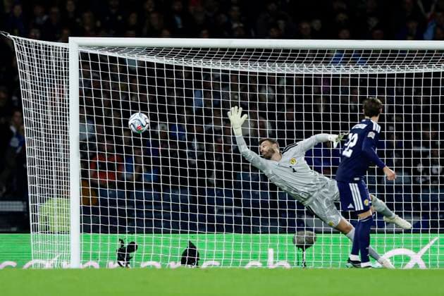 Scotland v Switzerland UEFA Nations League Angus Gunn of Scotland cant save Ricardo Rodriguez of Switzerland™s freekick during the UEFA Nations League Group B1 match at Barclays Hampden, Glasgow 29 09 2026 UK Newspapers OUT Copyright: xJamiexJohnstonx FIL-24011-0088