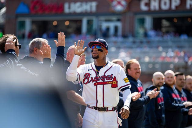 Ronald Acuna Jr. 13 of the Atlanta Braves high fives teammates during the pregame against the Philadelphia Phillies in game one of the MLB, Baseball Herren, USA National League Wild Card round at Truist Park on Tuesday, September 29, 2026 in Atlanta, Georgia.  ATL20260928101 JULIANxALEXANDER