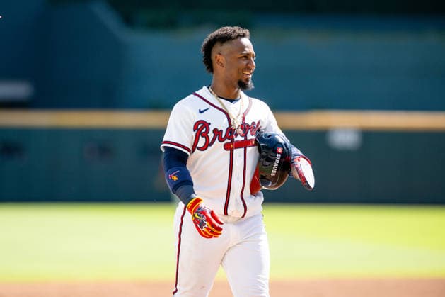 Ozzie Albies 1 of the Atlanta Braves smiles on third base during the game against the Philadelphia Phillies in game one of the MLB, Baseball Herren, USA National League Wild Card round at Truist Park on Tuesday, September 29, 2026 in Atlanta, Georgia.  ATL20260928118 JULIANxALEXANDER