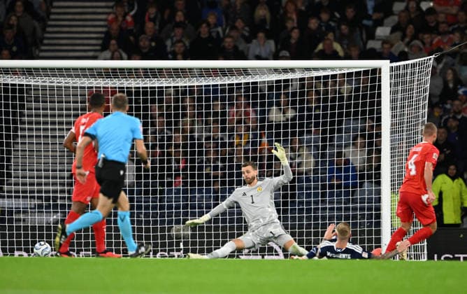 Glasgow, Scotland, 29th September 2026. Nico Elvedi of Switzerland scores his sides 2nd goal during the Scotland vs Switzerland UEFA Nations League match at Hampden Park, Glasgow. Picture credit should read: Neil Hanna Sportimage EDITORIAL USE ONLY. No use with unauthorised audio, video, data, fixture lists, club league logos or live services. Online in-match use limited to 120 images, no video emulation. No use in betting, games or single club league player publications. SPI_050_Scotland_Switzerland SPI-5047-0049