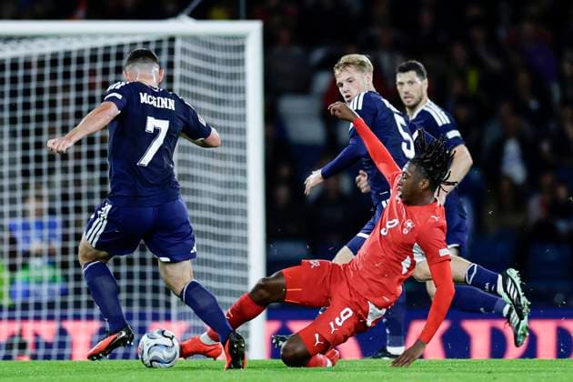 Scotland v Switzerland UEFA Nations League John McGinn of Scotland is tackled by Johan Manzambi of Switzerland during the UEFA Nations League Group B1 match at Barclays Hampden, Glasgow 29 09 2026 UK Newspapers OUT Copyright: xJamiexJohnstonx FIL-24011-0115