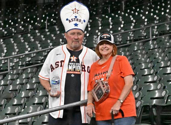 Houston Astros fans pose for a photo before the start of an MLB, Baseball Herren, USA American League Wild Card game against the Chicago White Sox at Daikin Park in Houston, Texas, on Tuesday, September 29, 2026.  HOU20260929703 MARIAxLYSAKER