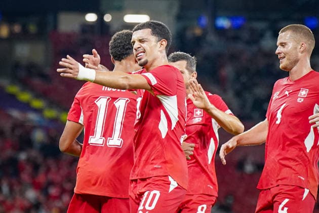 Soccer: UEFA Nations League 2026–2027, Matchday 2: Scotland vs. Switzerland at Hampden Park, Glasgow—Goal and celebration following Zeki Amdouni’s goal for Switzerland (0–3), 10: Joy, emotions, celebration, gesture, body language, emotion Copyright: xJOERANxSTEINSIEKx