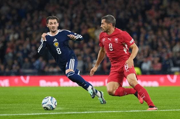 UK: UEFA Nations League, Scotland v Switzerland at Barclays Hampden, Glasgow, Scotland on 29 September 2026: Pictured: Billy Gilmour (Scotland) and Remo Freuler (Switzerland) Glasgow Barclays Hampden Scotland Copyright: xAlexxToddx
