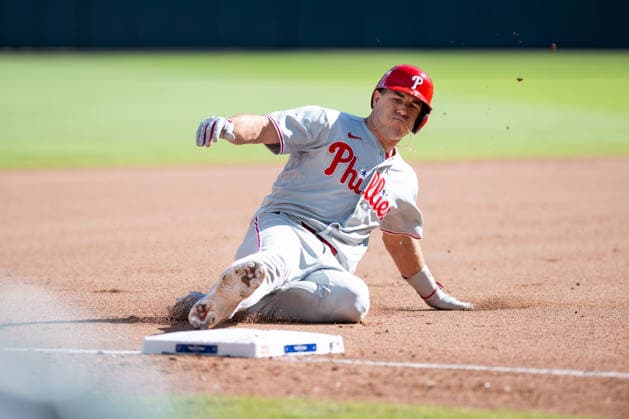 J.T. Realmuto 10 of the Philadelphia Phillies slides into third base in the seventh inning against the Atlanta Braves in game one of the MLB, Baseball Herren, USA National League Wild Card round at Truist Park on Tuesday, September 29, 2026 in Atlanta, Georgia.  ATL20260928120 JULIANxALEXANDER