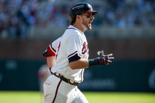 Austin Riley 27 of the Atlanta Braves celebrates after hitting a home run in the eighth inning against the Philadelphia Phillies in game one of the MLB, Baseball Herren, USA National League Wild Card round at Truist Park on Tuesday, September 29, 2026 in Atlanta, Georgia.  ATL20260928132 JULIANxALEXANDER