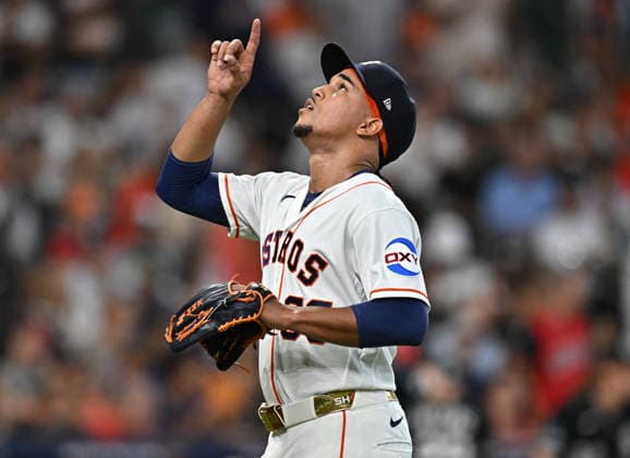 Houston Astros pitcher Miguel Ullola (66) gestures after striking out Chicago White Sox designated hitter Andrew Benintendi with the bases loaded to end the second inning in an MLB, Baseball Herren, USA American League Wild Card game in Houston, Texas, on Tuesday, September 29, 2026.  HOU20260929722 MARIAxLYSAKER