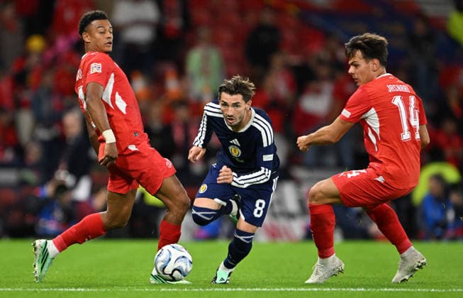 Glasgow, Scotland, 29th September 2026. Dan Ndoye of Switzerland, Billy Gilmour of Scotland and Ardon Jashari of Switzerland during the Scotland vs Switzerland UEFA Nations League match at Hampden Park, Glasgow. Picture credit should read: Neil Hanna Sportimage EDITORIAL USE ONLY. No use with unauthorised audio, video, data, fixture lists, club league logos or live services. Online in-match use limited to 120 images, no video emulation. No use in betting, games or single club league player publications. SPI_108_Scotland_Switzerland SPI-5047-0108