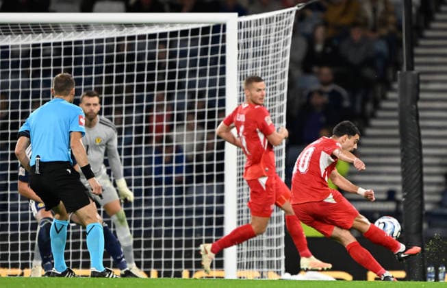 Glasgow, Scotland, 29th September 2026. Zeki Amdouni of Switzerland scores his sides 3rd goal during the Scotland vs Switzerland UEFA Nations League match at Hampden Park, Glasgow. Picture credit should read: Neil Hanna Sportimage EDITORIAL USE ONLY. No use with unauthorised audio, video, data, fixture lists, club league logos or live services. Online in-match use limited to 120 images, no video emulation. No use in betting, games or single club league player publications. SPI_128_Scotland_Switzerland SPI-5047-0128