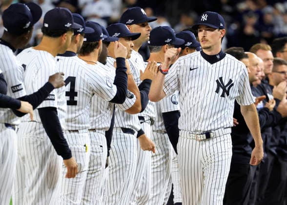 New York Yankees pitcher Gerrit Cole (45) greets teammates before the start of an MLB, Baseball Herren, USA American League Wild Card game against the Boston Red Sox at Yankee Stadium in New York City, on Tuesday, September 29, 2026.  NYP20260929705 COREYxSIPKIN