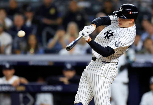 New York Yankees designated hitter Ben Rice (22) hits a double against the Boston Red Sox in the first inning of an MLB, Baseball Herren, USA American League Wild Card game at Yankee Stadium in New York City, on Tuesday, September 29, 2026.  NYP20260929712 COREYxSIPKIN
