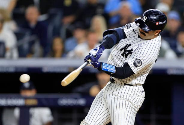 New York Yankees Austin Wells (28) hits an rbi-single against the Boston Red Sox in the second inning of an MLB, Baseball Herren, USA American League Wild Card game at Yankee Stadium in New York City, on Tuesday, September 29, 2026.  NYP20260929716 COREYxSIPKIN