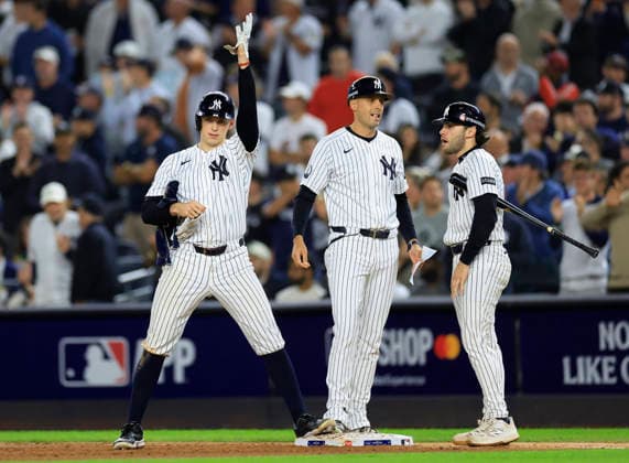 New York Yankees designated hitter Ben Rice (22) stands on first base after hitting an rbi-single against the Boston Red Sox in the seventh inning of an MLB, Baseball Herren, USA American League Wild Card game at Yankee Stadium in New York City, on Tuesday, September 29, 2026.  NYP20260929726 COREYxSIPKIN