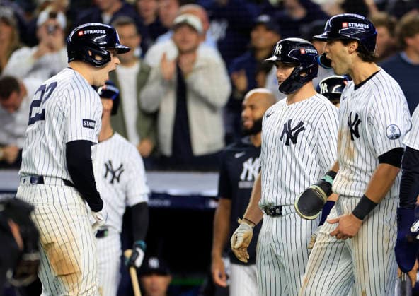 New York Yankees designated hitter Ben Rice (L) is congratulated by teammates after hitting a grand slam home run in the eighth inning to give the Yankees a 9-0 lead over the Boston Red Sox in an MLB, Baseball Herren, USA American League Wild Card game at Yankee Stadium in New York City, on Tuesday, September 29, 2026.  NYP20260929731 COREYxSIPKIN