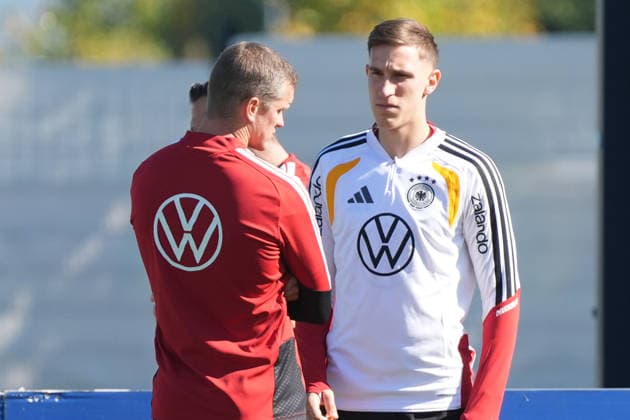 Assistant Coach Sven Bender (Germany) in conversation with Nico Schlotterbeck (Germany) at HerzoBase on September 30, 2026: German National Team, Nations League preparation, home ground, HerzoBase, World of Adidas, Herzogenaurach