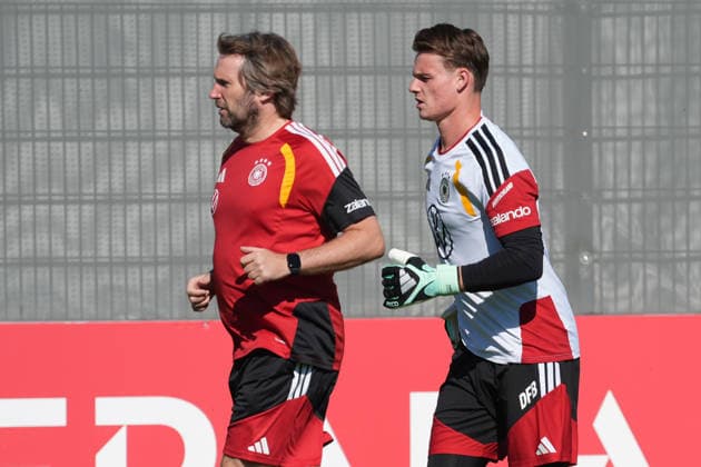 Goalie Jonas Urbig (Germany) with Goalie Coach Stefan Wessels (Germany) at HerzoBase on September 30, 2026: German National Team Nations League Preparation, Home Ground, HerzoBase, World of Adidas, Herzogenaurach