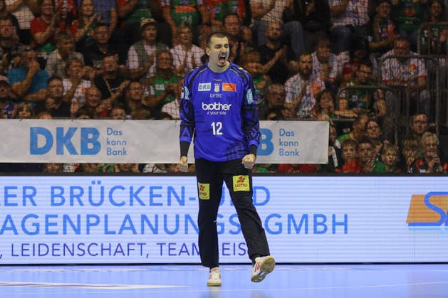 September 30, 2026, xgox, Opel HBL Handball, SC Magdeburg vs. THW Kiel, emspor, from left: Matej Mandic (Magdeburg), 12 celebrating a saved shot, blocked, saved, Magdeburg goalkeeper