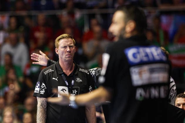 Coach Borge Lund of THW Kiel and, out of focus, Coach Bennet Wiegert of SC Magdeburg. Handball Bundesliga, 2026–2027 season. SC Magdeburg vs. THW Kiel at the GETEC Arena in Magdeburg. Handball, Germany, September 30, 2026