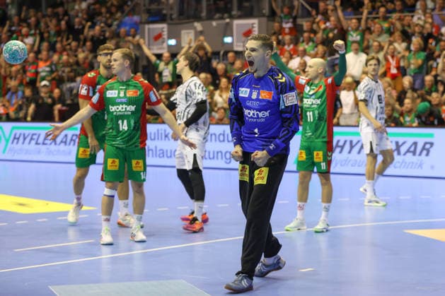 September 30, 2026, xgox, Opel HBL Handball, SC Magdeburg vs. THW Kiel, emspor, from left: Dominik Kuzmanovic (Magdeburg), celebrating a saved shot, blocked, saved, Magdeburg goalkeeper