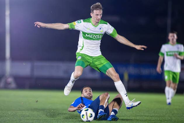 September 30, 2026, xkwix, Soccer, Krombacher Westphalia Cup, SC Herford vs. FC Gütersloh, Ludwig Jahn Stadium, Round of 16, 2026–2027 Season: Hannes John (FC Gütersloh, 25) in a tackle against Konstantinos Keissoglou (SC Herford, 21). DFB regulations prohibit any use of photographs as image sequences and or quasi-video. Photo: xKamilxWilkowskixPressefotoKochx, North Rhine-Westphalia Germany