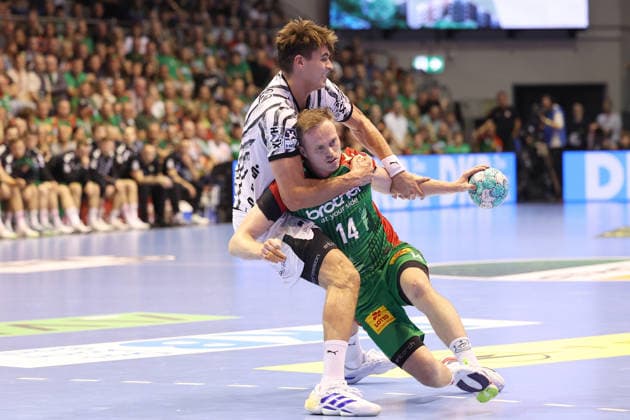 September 30, 2026, xBHAx, Handball, Opel HBL, 2026–2027 season, 1st HBL, SC Magdeburg vs. THW Kiel, GETEC Arena, Julian Köster (THW Kiel) 7 on defense against Omar Ingi Magnusson (SC Magdeburg) 14, Saxony-Anhalt, Germany