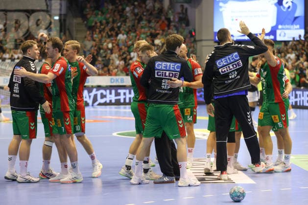 September 30, 2026, xgox, Opel HBL Handball, SC Magdeburg vs. THW Kiel, emspor, from left: Magdeburg celebrating the victory, Magdeburg celebrating after the game