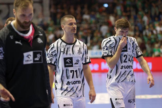 September 30, 2026, xgox, Opel HBL Handball, SC Magdeburg vs. THW Kiel, emspor, from left: Elias Ellefsen, Skipagotu (Kiel), 71 Lukas Zerbe (Kiel), 24 looks disappointed, looks dejected, looks downcast, Magdeburg