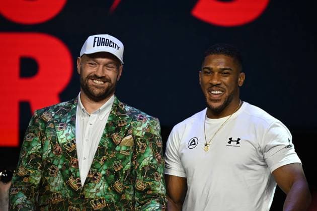 Tyson Fury and Anthony Joshua hold press conference, PK, Pressekonferenz in London before December clash LONDON, UNITED KINGDOM - SEPTEMBER 30: British heavyweight boxers Tyson Fury (L) and Anthony Joshua (R) hold a press conference at the British Airways ARC at Olympia ahead of their bout on December 11 at Principality Stadium in Cardiff, in London, United Kingdom on September 30, 2026. Rasid Necati Aslim Anadolu London United Kingdom. Editorial use only. Please get in touch for any other usage.  Copyright: x2026xAnadoluxRasidxNecatixAslimx