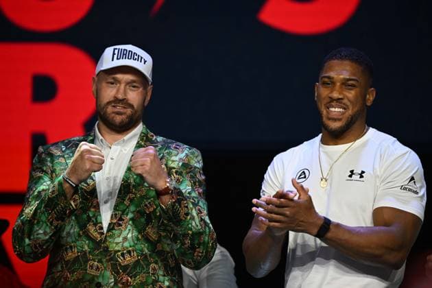 Tyson Fury and Anthony Joshua hold press conference, PK, Pressekonferenz in London before December clash LONDON, UNITED KINGDOM - SEPTEMBER 30: British heavyweight boxers Tyson Fury (L) and Anthony Joshua (R) hold a press conference at the British Airways ARC at Olympia ahead of their bout on December 11 at Principality Stadium in Cardiff, in London, United Kingdom on September 30, 2026. Rasid Necati Aslim Anadolu London United Kingdom. Editorial use only. Please get in touch for any other usage.  Copyright: x2026xAnadoluxRasidxNecatixAslimx