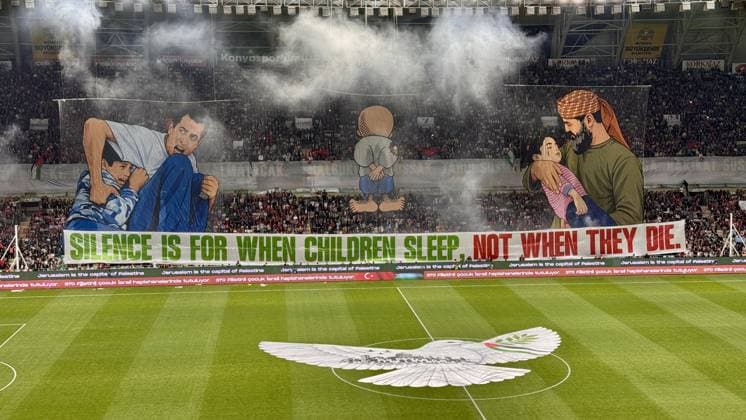 Konyaspor v Palestine - Friendly KONYA, TURKIYE - SEPTEMBER 30: Fans unveil a large choreo in the east stands depicting Muhammad al-Durrah, the 12-year-old killed in front of the world during the Second Intifada in 2000, Handala, the iconic symbol of Palestinian resistance, and Palestinian grandfather Khaled Nabhan holding his granddaughter Reem, whom he mourned as the soul of my soul following her death in Gaza, during a friendly match between Palestine national team, Nationalteam and TUMOSAN Konyaspor as part of Palestine Day events at Konya Metropolitan Municipality Stadium in Konya, Turkiye on September 30, 2026. Abdullah Dogan Anadolu Konya Turkey. Editorial use only. Please get in touch for any other usage.  Copyright: x2026xAnadoluxAbdullahxDoganx