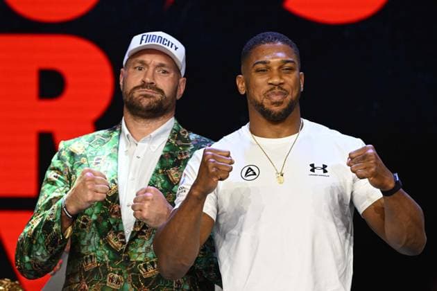 Tyson Fury and Anthony Joshua hold press conference, PK, Pressekonferenz in London before December clash LONDON, UNITED KINGDOM - SEPTEMBER 30: British heavyweight boxers Tyson Fury (L) and Anthony Joshua (R) attend a press conference at British Airways ARC, Olympia ahead of their December 11 fight at Principality Stadium in Cardiff, in London, United Kingdom, on September 30, 2026. Rasid Necati Aslim Anadolu London United Kingdom. Editorial use only. Please get in touch for any other usage.  Copyright: x2026xAnadoluxRasidxNecatixAslimx