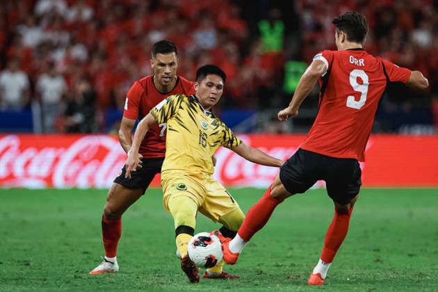 Brunei Darussalam v Hong Kong, China - FIFA ASEAN CUP Division 2 Group A 16 Abdul Haris Herman of Brunei Darussalam and 7 Juninho of Hong Kong, China compete during the FIFA ASEAN Cup 2026 Division 2 Group A match between Brunei Darussalam and Hong Kong, China at Kai Tak Stadium in Hong Kong, China, on September 30, 2026. Hong Kong China  Copyright: xZhichengxQinx originalFilename:qin-fifaasea260930_npg63.jpg