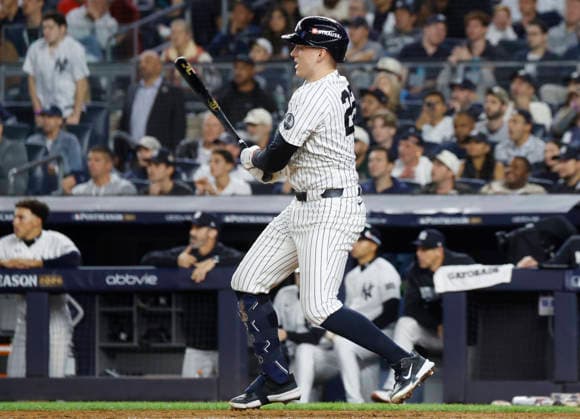 New York Yankees designated hitter Ben Rice (22) hits a single against the Boston Red Sox in the fifth inning of an MLB, Baseball Herren, USA American League Wild Card game at Yankee Stadium in New York City, on Wednesday, September 30, 2026.  NYP20260930711 JOHNxANGELILLO