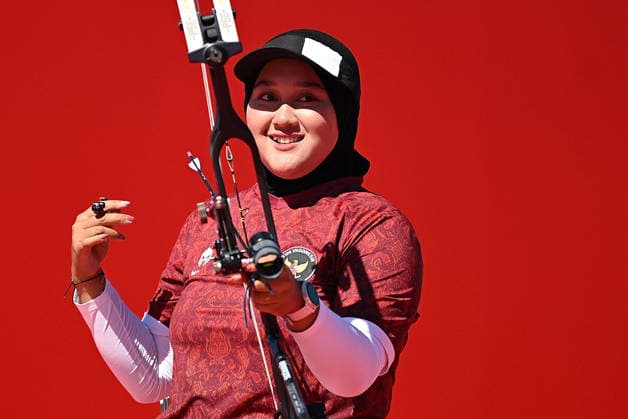 (261001) -- OKAZAKI, Oct. 1, 2026 -- Nurisa Dian Ashrifah of Indonesia reacts during the compound women s individual gold medal match of archery between Nurisa Dian Ashrifah of Indonesia and Amaya Amparo Cojuangco of the Philippines at the 20th Asian Games Aichi-Nagoya 2026 in Okazaki of Aichi Prefecture, Japan, Oct. 1, 2026. ) (SP)JAPAN-OKAZAKI-ASIAN GAMES-ARCHERY-COMPOUND WOMEN S INDIVIDUAL-GOLD MEDAL MATCH YuxYang 