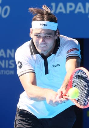 October 1, 2026, Tokyo, Japan - Taylor Fritz of the United States returns the ball against Jaumu Munar of Spain during the first round match of the Japan Open tennis championship at the Ariake Colosseum in Tokyo on Thursday, October 1, 2026. (photo by Yoshio Tsunoda AFLO) Noxthirdxpartyxsales  0868287398st YoshioxTsunodax