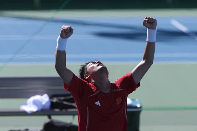 (261001) -- NAGOYA, Oct. 1, 2026 -- Wu Yibing of China celebrates after the men s singles quarterfinals of tennis against Sumit Nagal of India at the 20th Asian Games Aichi-Nagoya 2026 in Nagoya, Japan, Oct. 1, 2026. ) (SP)JAPAN-NAGOYA-ASIAN GAMES-TENNIS-MEN S SINGLES LixBo 
