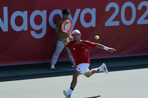 (261001) -- NAGOYA, Oct. 1, 2026 -- Wu Yibing of China competes during the men s singles quarterfinals of tennis against Sumit Nagal of India at the 20th Asian Games Aichi-Nagoya 2026 in Nagoya, Japan, Oct. 1, 2026. ) (SP)JAPAN-NAGOYA-ASIAN GAMES-TENNIS-MEN S SINGLES LixBo 