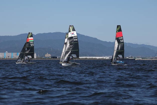 (261001) -- GAMAGORI, Oct. 1, 2026 -- Sailors prepare ahead of the Men s Skiff Opening Series Race of Sailing at the 20th Asian Games Aichi-Nagoya 2026 in Gamagori of Aichi Prefecture, Japan, Oct. 1, 2026. ) (SP)JAPAN-GAMARORI-ASIAN GAMES-SAILING-MEN S SKIFF DengxHua 