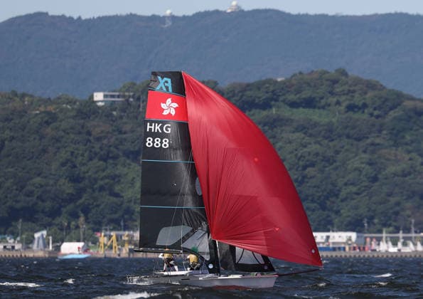 (261001) -- GAMAGORI, Oct. 1, 2026 -- Mak Hiu Tung Tiffany and Emily Grace Polson of China s Hong Kong compete during the Women s Skiff Opening Series Race of Sailing at the 20th Asian Games Aichi-Nagoya 2026 in Gamagori of Aichi Prefecture, Japan, Oct. 1, 2026. ) (SP)JAPAN-GAMAGORI-ASIAN GAMES-SAILING-WOMEN S SKIFF DengxHua 
