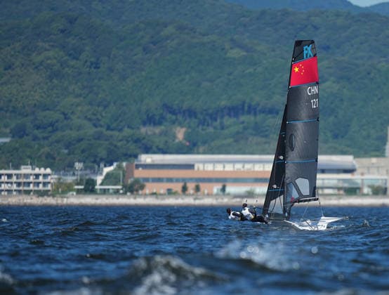 (261001) -- GAMAGORI, Oct. 1, 2026 -- Hu Xiaoyu (R), Sun Yuyue of China compete during the Women s Skiff Opening Series Race of Sailing at the 20th Asian Games Aichi-Nagoya 2026 in Gamagori of Aichi Prefecture, Japan, Oct. 1, 2026. ) (SP)JAPAN-GAMAGORI-ASIAN GAMES-SAILING-WOMEN S SKIFF CheongxKamxKa 