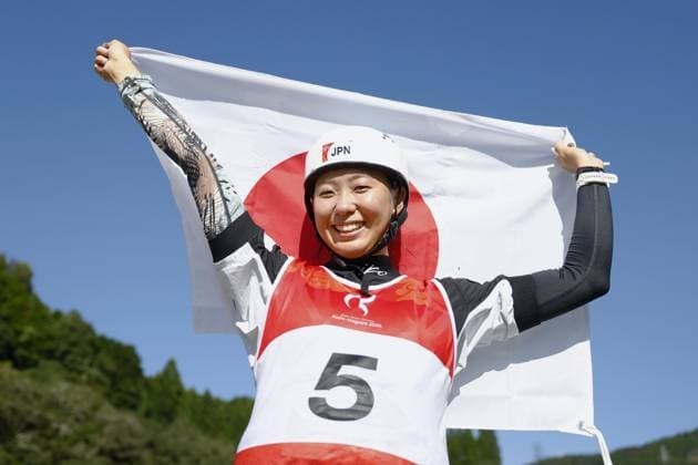 Aichi-Nagoya Asian Games: Canoe Slalom Japan s Kurumi Ito celebrates after winning gold in the Aichi-Nagoya Asian Games women s kayak single at Yahagigawa Canoe Slalom Course in Toyota in Aichi Prefecture, central Japan, on Oct. 1, 2026.  A14AA0005629602P