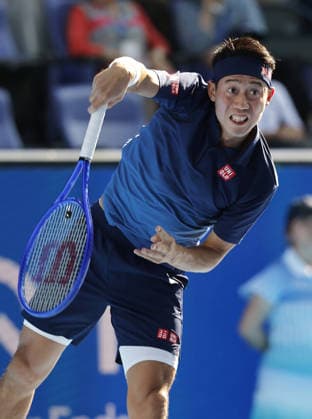 Tennis: Nishikori s final match Japan s former world No. 4 Kei Nishikori competes en route to losing to Frances Tiafoe of the United States in the first round of the final tournament of his tennis career at the Japan Open at Ariake Tennis Park in Tokyo on Oct. 1, 2026. The 36-year-old Nishikori, the first Asian male player to reach a Grand Slam singles final at the 2014 U.S. Open, announced in April 2026 that he would retire at the end of the current season.  A14AA0005629620P