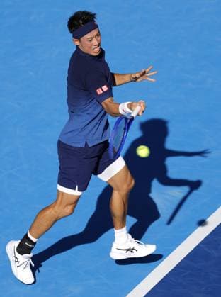 Tennis: Nishikori s final match Japan s former world No. 4 Kei Nishikori competes en route to losing to Frances Tiafoe of the United States in the first round of the final tournament of his tennis career at the Japan Open at Ariake Tennis Park in Tokyo on Oct. 1, 2026. The 36-year-old Nishikori, the first Asian male player to reach a Grand Slam singles final at the 2014 U.S. Open, announced in April 2026 that he would retire at the end of the current season.  A14AA0005629629P