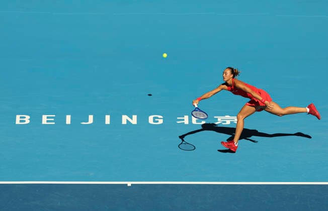 (261001) -- BEIJING, Oct. 1, 2026 -- Zheng Qinwen competes during the women s singles first round match between Zheng Qinwen of China and Shi Han of China at 2026 China Open tennis tournament in Beijing, China, Oct. 1, 2026. ) (SP)CHINA-BEIJING-TENNIS-CHINA OPEN-WOMEN S SINGLES(CN) BaixXuefei 