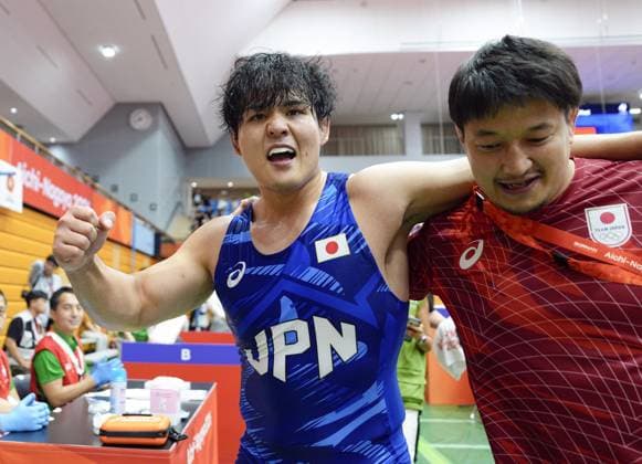 Aichi-Nagoya Asian Games: Wrestling Japan s Yuri Nakazato (L) celebrates after beating Nitesh of India in the Aichi-Nagoya Asian Games men s wrestling Greco-Roman 97-kilogram final at Nagoya City Inae Sports Center in Nagoya, central Japan, on Oct. 1, 2026.  A14AA0005629662P