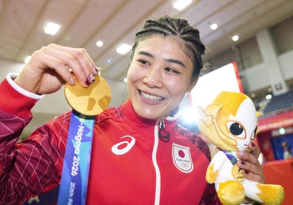 Aichi-Nagoya Asian Games: Wrestling Japan s Nonoka Ozaki celebrates after winning the Aichi-Nagoya Asian Games women s wrestling 62-kilogram gold at Nagoya City Inae Sports Center in Nagoya, central Japan, on Oct. 1, 2026.  A14AA0005629676P