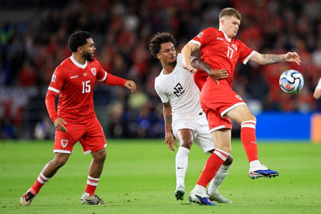 Wales v Denmark UEFA Nations League Joredan James of Wales battles for the ball with Oscar Bobb Of Norway during the UEFA Nations League Group D match at the Cardiff City Stadium, Cardiff 01 10 2026 UK Newspapers OUT Copyright: xGeraintxNicholasx FIL-24019-0030