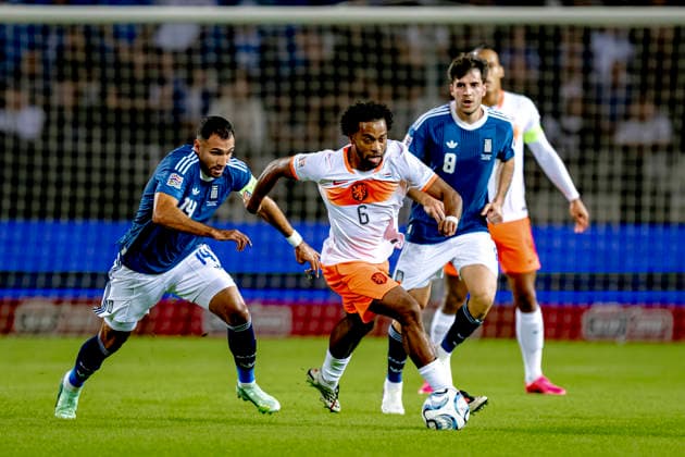THESSALONIKI, Greece: Forward Vangelis Pavlidis of Greece and midfielder Quinten Timber of the Netherlands during the UEFA Nations League match between Greece and the Netherlands at Toumba Stadium on October 1, 2026, in Thessaloniki, Greece. Photo by DeFodi Images