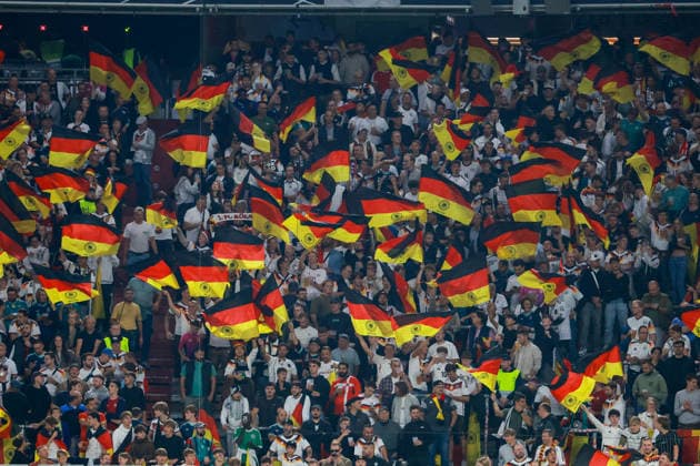 UEFA Nations League, Matchday 26–27: Germany vs. Serbia on October 1, 2026, at the Allianz Arena in Munich. Fans of the German national team wave their flags. MH