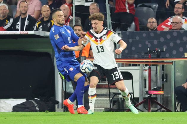October 1, 2026, xrekx, Soccer, UEFA Nations League, Germany vs. Serbia, Filip Kostic (Serbia) vs. Philipp Treu (Germany), tackle, action, battle for the ball, Munich